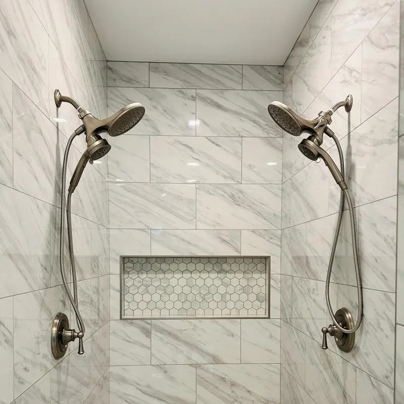 Double-head marble shower with penny-round niche, Atlanta GA