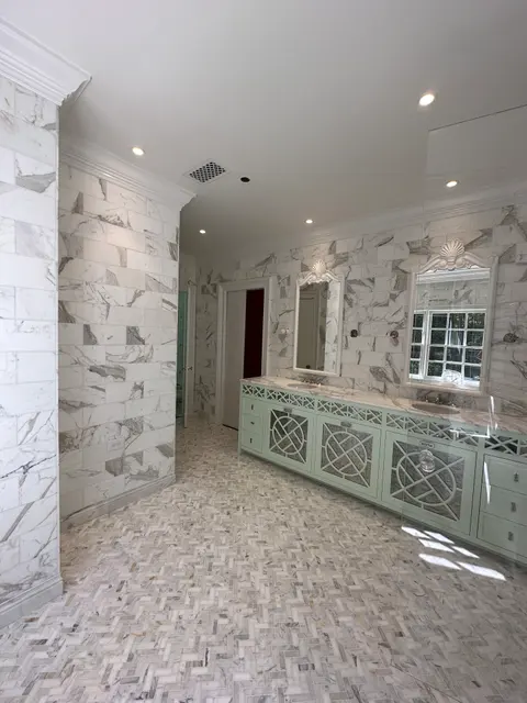 Marble-look master bathroom set by B & B Pro Tile in Atlanta