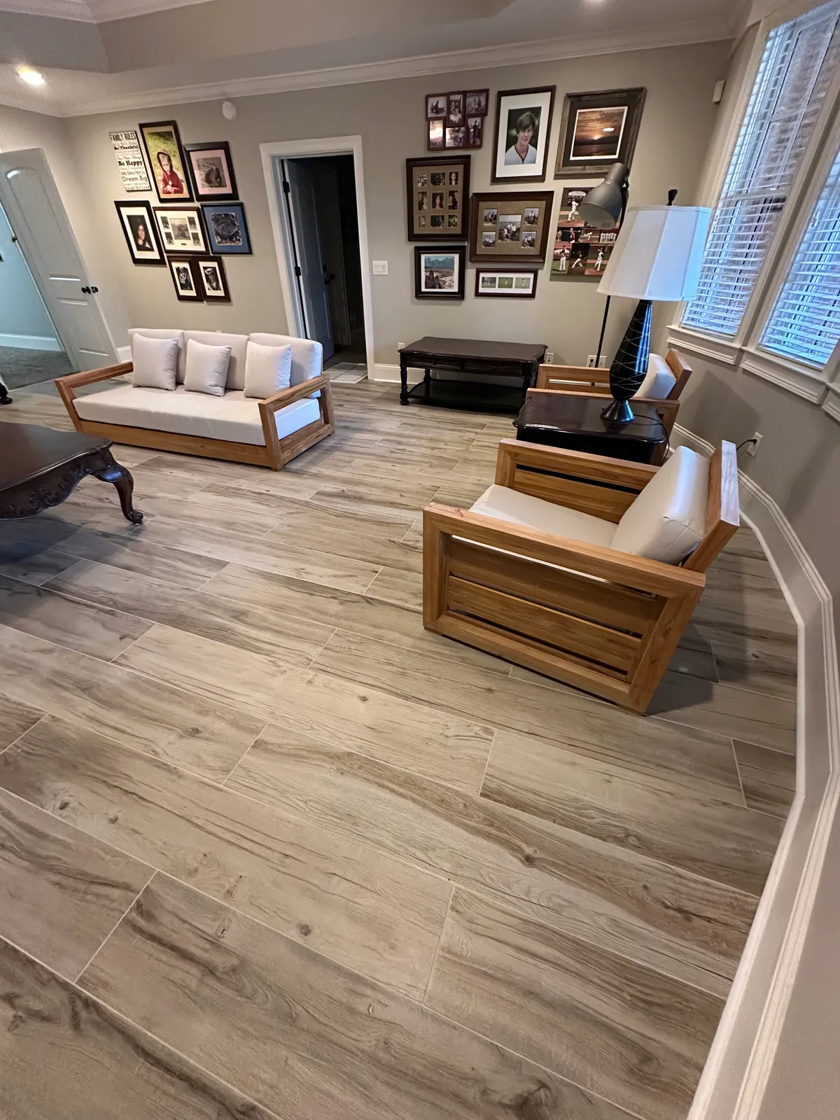 Wood-look porcelain plank flooring through a living room, Atlanta GA
